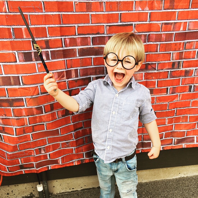 My Son, James, with the Ravenclaw Wand I Made at the Wand-Making Station. Photo Credit: J.H. Winter